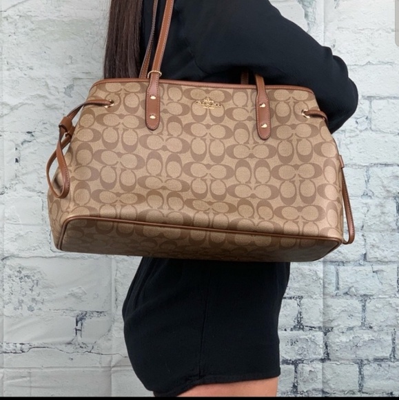 Coach Handbags - 🆕️Cheap Coach Drawstring Carryall 👜